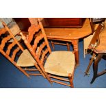 A PINE KITCHEN TABLE and three rush seated chairs (4)