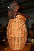 A WICKER LINEN BASKET and a stool (2)
