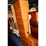 A MODERN PINE CHEST OF THREE DRAWERS and matching pair of three drawer bedside chests (3)