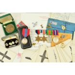 A BOX CONTAINING MEDALS, PAPERWORK AND OTHER MATERIAL, relating to the WWII service of an Airman