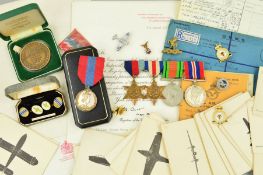 A BOX CONTAINING MEDALS, PAPERWORK AND OTHER MATERIAL, relating to the WWII service of an Airman