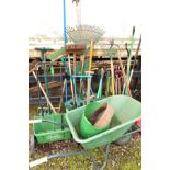 A COLLECTION OF VARIOUS GARDEN TOOLS comprising of a push along seeder, two scarifiers, plastic