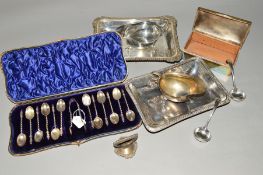 A CASED SET OF TWELVE LATE VICTORIAN/EDWARDIAN SILVER APOSTLE TOP TEASPOONS AND MATCHING SUGAR