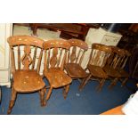 A NEAR SET OF SIX EARLY 20TH CENTURY ELM AND BEECH KITCHEN CHAIRS