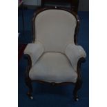 AN EARLY VICTORIAN MAHOGANY PARLOUR ARMCHAIR on ceramic casters (sd)