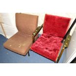 A MID 20TH CENTURY ARMCHAIR ON A SHAPED FRAME, together with another upholstered metal framed
