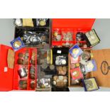 A CARDBOARD BOX CONTAINING TINS AND BOXES OF WORLD COINS, to include silver coins, penny, halfpenny,