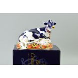 A BOXED ROYAL CROWN DERBY PAPERWEIGHT, Freisian Cow, 'Buttercup' (silver stopper, seconds)