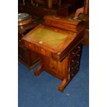 A VICTORIAN WALNUT AND SATINWOOD INLAID DAVENPORT, with a hinged top and four drawers to the