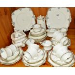 A PARAGON 'BRISTOL' TEASET, to include twelve cups and saucers, teapot, water jug and side plates,