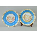 A PAIR OF SEVRES STYLE CABINET PLATES, decorated with cherubs, approximate diameter 24cm (2)