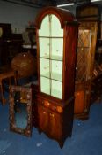 A SLIM REPRODUCTION MAHOGANY GLAZED SINGLE DOOR DISPLAY CABINET with a single drawer, width 48cm x