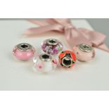 FIVE PANDORA CHARMS AND A MAKERS BOX to include two glass charms with floral detail, one glass charm