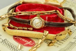 A LADY'S ACCURIST WRISTWATCH AND TWO BROKEN WATCH STRAPS, the watch with a circular head and baton