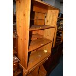 A MODERN BEECH COMPUTER DESK, two open bookcases and an Old Charm two door TV cabinet (4)