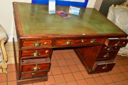 A VICTORIAN MAHOGANY TWIN PEDESTAL PARTNERS DESK, having gilt tooled green leather skiver over