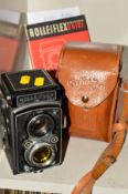 A ROLLEIFLEX 3.5 B TWIN LENS REFLEX CAMERA, in leather case and fitted with a Heidoscop 2.8