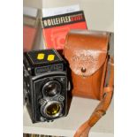 A ROLLEIFLEX 3.5 B TWIN LENS REFLEX CAMERA, in leather case and fitted with a Heidoscop 2.8