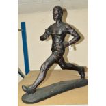 A LARGE FIGURE OF A RUNING MAN, height approximately 60cm