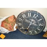 A MODERN CIRCULAR FRENCH STYLE WALL CLOCK together with a bag containing a pair of curtains (2)