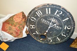 A MODERN CIRCULAR FRENCH STYLE WALL CLOCK together with a bag containing a pair of curtains (2)