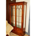 A BEVAN FUNNELL BURR WALNUT ASTRAGAL GLAZED TWO DOOR DISPLAY CABINET with three adjustable glass