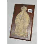 A ROYAL EXCHANGE FIRE MARK, cast lead plaque with minor damage, mounted on wooden plinth