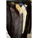 A LONG VINTAGE FUR COAT, a sheepskin long belted coat with fur trim and two other coats (4)