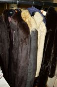 A LONG VINTAGE FUR COAT, a sheepskin long belted coat with fur trim and two other coats (4)