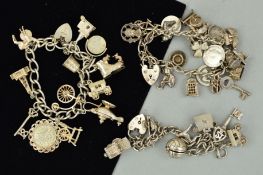 THREE CHARM BRACELETS, the curb link bracelets suspending a total of 38 charms, to include a