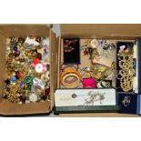 TWO BOXES OF MAINLY COSTUME JEWELLERY to include an egg shape pendant enclosing a bird, an