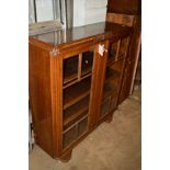 AN ART DECO OAK ASTRAGAL GLASSED TWO DOOR BOOKCASE, width 107cm x depth 32cm x height 115cm (two