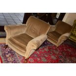 A PAIR OF VICTORIAN WALNUT FRAMED ARMCHAIRS on ball and claw feet