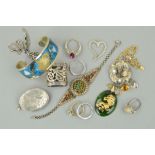 A SELECTION OF JEWELLERY, to include an oval nephrite jade pendant, an oval silver locket, with