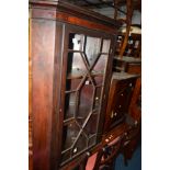 A GEORGIAN MAHOGANY ASTRAGAL GLAZED HANGING CORNER CUPBOARD, together with a smaller hanging