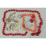 A SELECTION OF JEWELLERY, to include a broken red plastic bead necklace, a branch coral necklace,