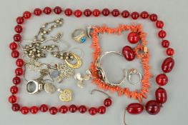 A SELECTION OF JEWELLERY, to include a broken red plastic bead necklace, a branch coral necklace,