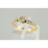 A MODERN 9CT GOLD DIAMOND SINGLE STONE RING, central diamond illusion set to diamond set