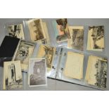 A POSTCARD ALBUM, loosely inserted, collection of cards showing post WWI damage in France