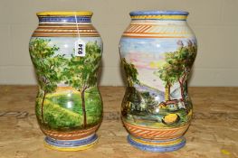 A PAIR OF PAINTED ITALIAN FAICENCE STYLE VASES DECORATED WITH COUNTRY SCENES, approximate height