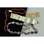 A SELECTION OF JEWELLERY to include a hinged panel bracelet set with green paste cabochons,