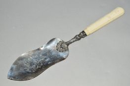 A 19TH CENTURY WHITE METAL IVORY HANDLED FISH SLICE, engraved blade, shell and scroll decoration,