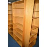 TWO MATCHING BEECH OPEN BOOKCASES, together with a matching slim open bookcase (3)