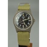 A GENT'S MILITARY C.W.C. QUARTZ WRISTWATCH, round case measuring approximately 36mm in diameter,