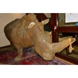 A LARGE MOULD MODEL OF A LIFE SIZE RHINO, approximate length 390cm x width 112cm x height 172cm (