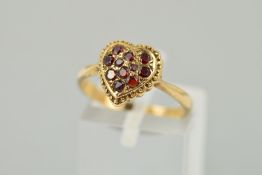 A MID TO LATE TWENTIETH CENTURY GARNET HEART SHAPED CLUSTER RING, ring size M, stamped '9ct',