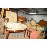 A PAIR OF FRENCH STYLE REPRODUCTION ARMCHAIRS with floral upholstery