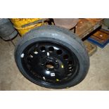 A SPACE SAVER WHEEL AND TYRE suitable for a Vauxhall Astra