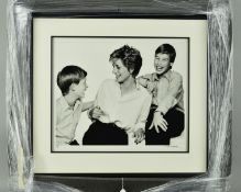 JOHN SWANNELL 'PRINCESS DIANA, PRINCE WILLIAM, PRINCE HARRY 1994', a black and white photographic