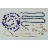 A COLLECTION OF JEWELLERY to include a silver bracelet with assorted charms, a lapis lazuli and